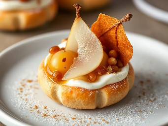 Choux bun filled with white chocolate mousse, pear compote, roasted pear and candied hazelnut shard.